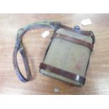 Great War mounted Infantry water bottle in its leather harness, marked 'Pulley & Powell 1917'.