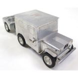 German novelty table lighter in the form of an american Jeep towing a trailer (ashtray), by W.