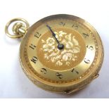 18ct gold ladies fob watch, black roman numerals on a gilt decorated dial, import marks for