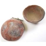 Two Ancient pottery vessels, height 4.8cm, diameter 9.5cm approx. and smaller