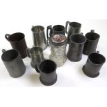 Collection of eleven tankards mostly pewter, including a moulded glass tankard with enamel pewter