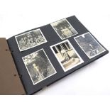 Naval related. A photograph album containing over 250 black and white photographs (mixed sizes)