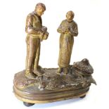 Brass musical desk stand mounted with two pilgrims praying 14 cm across