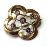 9ct Gold Floral Brooch with Amethysts and Seed Pearls (1 pearl missing) weight 1.9 grams
