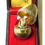 Silver gilt textured surprise egg by Stuart Devlin, London 1984, limited edition no. 31 of 100,