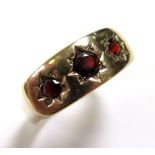 9ct Gold Gents Gypsy style Ring set with 3 Garnets size T weight 4.0 grams