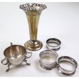 Mixed lot of silver, comprising flower tube, 3 napkin rings and 1 salt. Various h'mks & dates.