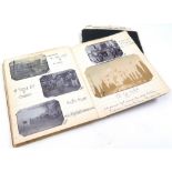 Pair of notebooks containing numerous black and white photograph and handwritten entries relating to