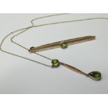 Bar brooch 9ct set with central peridot along with a peridot pendant on a fine chain, total weight