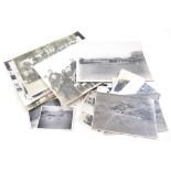 Collection of approximately thirty five black and white photographs including military related,