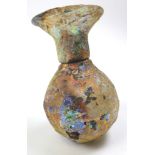 Roman 1st - 3rd Century glass bottle, with irridescent colour, 8cm high, 5.5cm wide