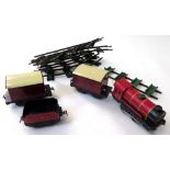 Chad Valley clockwork train set, comprising engine (3402) and tender, two carriages and eight