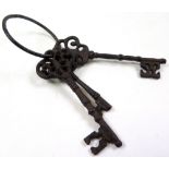 Set of three ornate iron keys, circa 16th / 17th century. From the personal collection of a