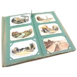 Postcard Album, circa early to mid 20th century, containing approx.seventy postcards, mainly