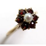 9ct Gold floral set Pearl and Garnet Ring size S weight 2.3 grams