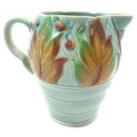 Clarice Cliff water jug with moulded foliate decoration, '41A' stamped to base, height 19.2cm