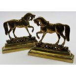 Pair of heavy 18th century fire dogs in the form of trotting horses 31 cm across and 28 cm high.