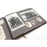 Album containing approximately nintey-five black and white photographs, circa 1940s, including