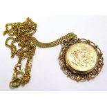 9ct Gold Floral pendant on a 22 inch 18ct Gold Necklace weight 11.5 grams