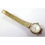 Ladies 9ct gold Omega wristwatch, on a 9ct gold bracelet. Total weight approx 16.3g