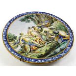 Large majolica charger, circa 19th century, of Italian style, depicting three women, three men and a