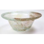 Roman 1st - 3rd Century glass bowl, the irridescent bowl with wide lip and bowed base, 12cm wide,