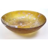 Roman 1st - 3rd Century glass bowl, of yellow colour, 15cm wide, 4cm high