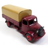 Dinky No413 Austin Covered Wagon with rare Maroon body, red hubs and tan cover. VGC