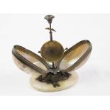 Mother of pearl egg shaped hinged watch holder on metal stand (screws coming loose at base)