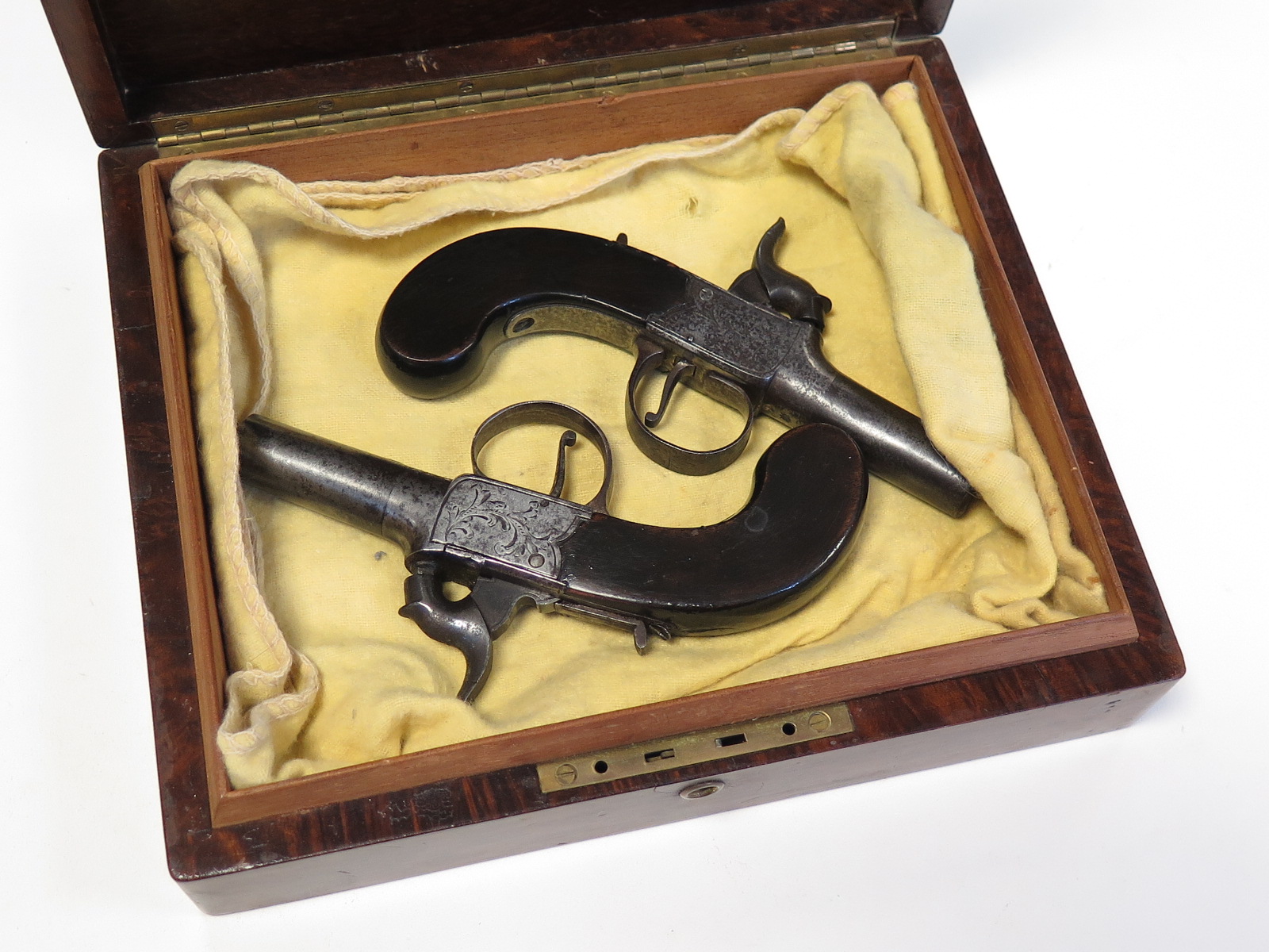 19th century matched pair of percussion box lock pistols with English proof marks in unlined case