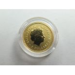 Australia gold $5 2000 (1/20th) BU in a hard plastic capsule