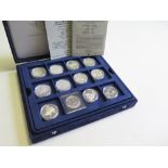 Canada, a collection of 36 Silver Dollars all either BU or Proof in hard plastic capsules and housed