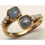 9ct Gold Ring set with Opals size O weight 2.6 grams