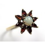 9ct Gold Garnet and Pearl Ring size O weight 2.7 grams