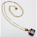 9ct Gold Rainbow Topaz Pendant on a 16 inch Chain weight 1.4 grams