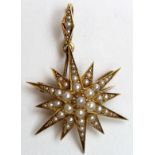 15ct Gold Starburst Pendant set with Seed Pearls weight 4.1 grams