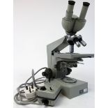 Carl Zeiss Jena microscope, with four rotating lenses, electric light bulb and switch, (untested),