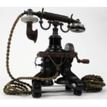 Early Ericsson skeleton telephone, hand crank operation, two bells, with early cords attached,