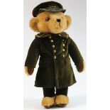 Merrythought Harrods bear, in doorman uniform, original label to base of right foot, height 45.5cm