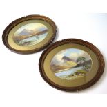 E.M. Earp, two glazed watercolours in oval frames, depicting lakeside scenes with mountains,