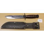 An Israeli 'K-BAR' fighting knife. Bowie blade 7" with broad fuller Star of David stamped to the