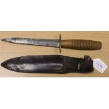 A scarce WW2 Fighting Knife d/edged blade 6.9". Blade marked 'John Blyde CLINTLOCK WORKS. SHEFFIELD'