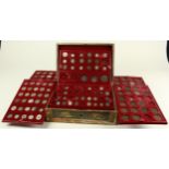 Collection of British, World and Ancient coins housed in a very old cabinet of 7 trays, includes