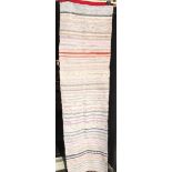 Textiles, a linen rag runner, with striped design, subtle mix of colours. including, beige, peach,