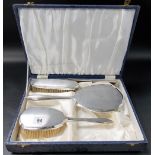 Silver engine turned four piece dressing table set by Mappin & Webb, comprising mirror, two