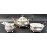 George V silver three piece tea set, of oval section and with gadrooned rim, maker E. Druiff & Co,