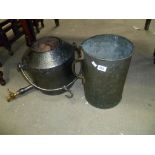 19th Century cast iron hot water pot, together with a large cylindrical copper measure (2)