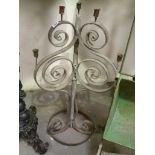 Wrought iron candelabra with three scroll supports, height 32'