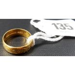 22ct wedding band, foliate engraved, weight 5.8g approx