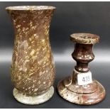 A Cornish red serpentine turned squat candlestick, height 4.5'; together with a Cornish serpentine